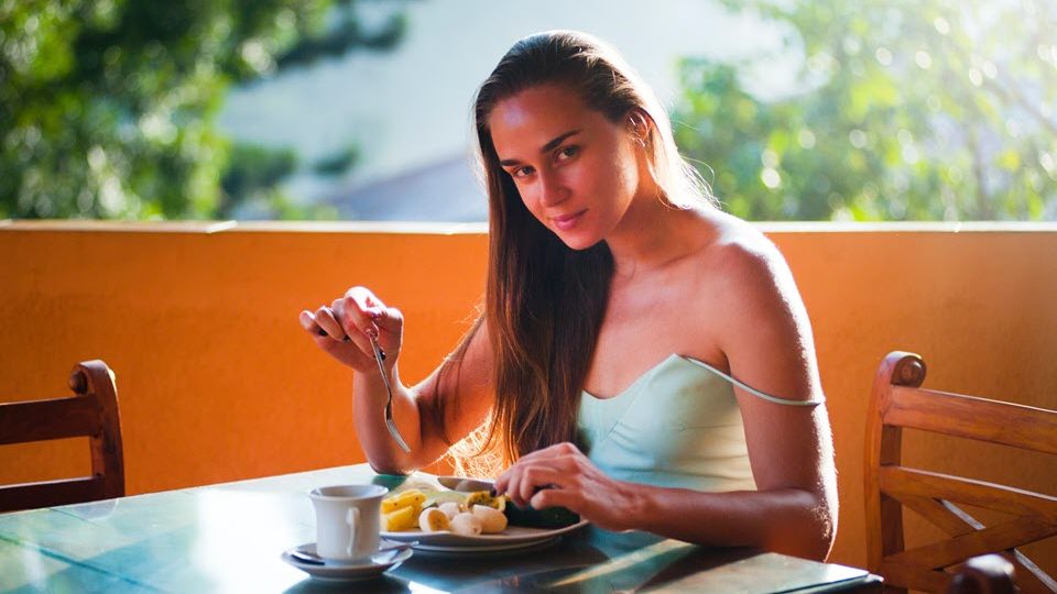 Woman eating for oral health